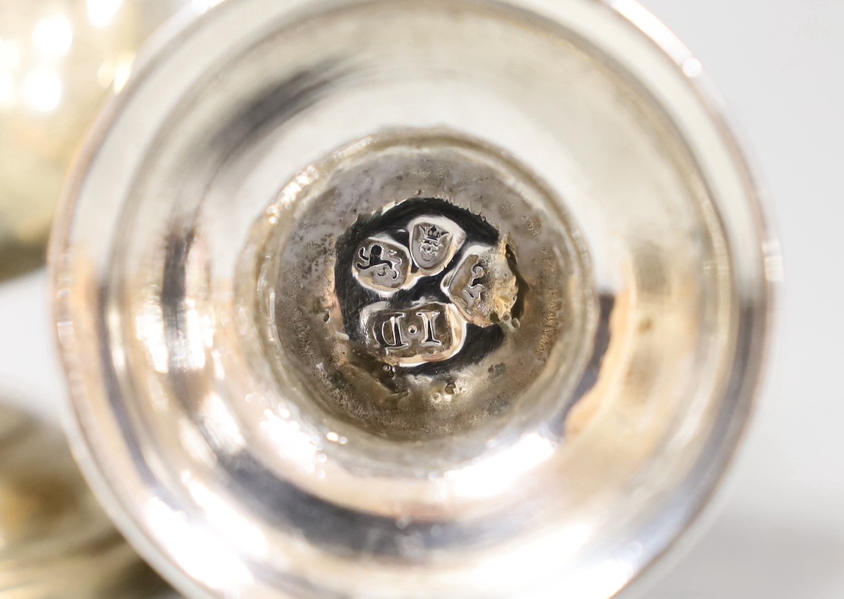 A George V silver baluster caster, Samuel Wood, London, 1759, 17.5cm, two other Georgian silver pepperettes and five late silver casters/pepperettes, gross weight 25oz.